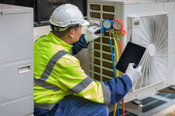 Professional Air Conditioning Repair technician working in Pine Village, IN